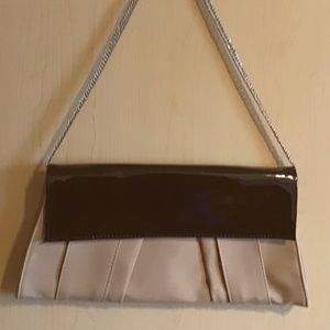 Black and beige clutch with silver chain handle